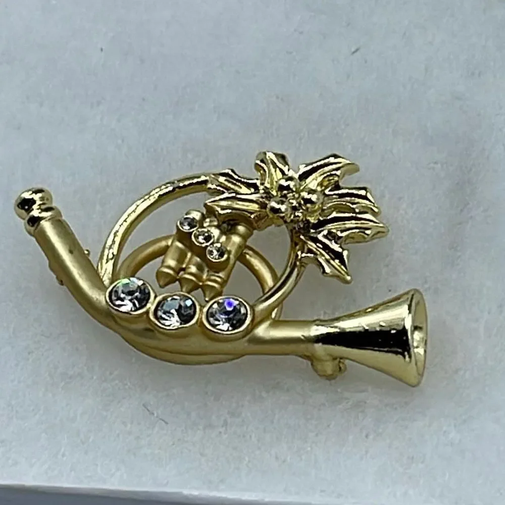 Vintage AGC matte and shiny embellished French Horn brooch.